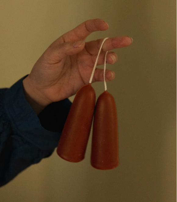 Pair of poppy red candles, hanging from hand made from beeswax, Ondine Ash