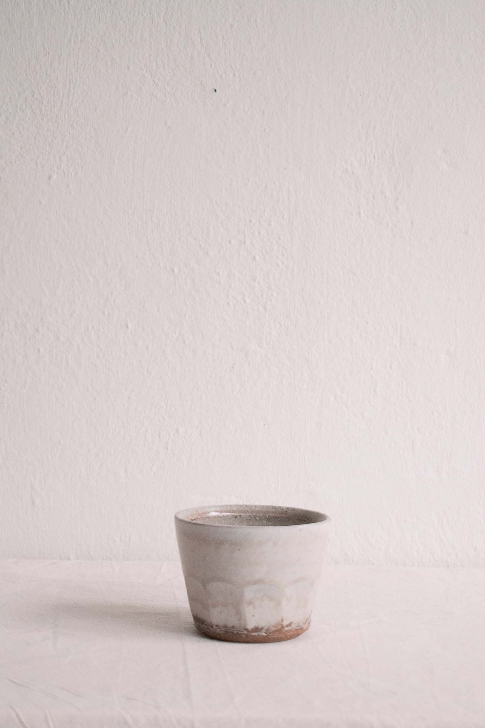 Handmade faceted plant pot by Tim Lake.