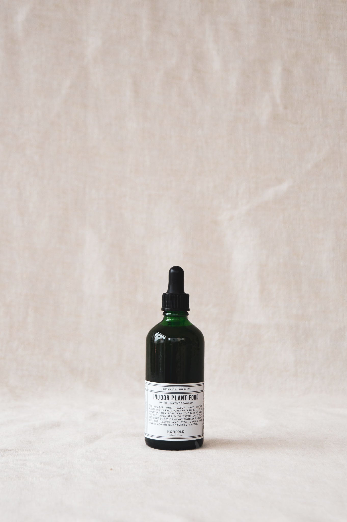 Product shot of indoor plant food, available at Ondine Ash, Falmouth