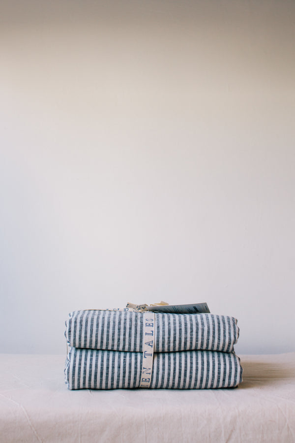 image of folded linen bedding grey and white stripes, Ondine Ash Falmouth