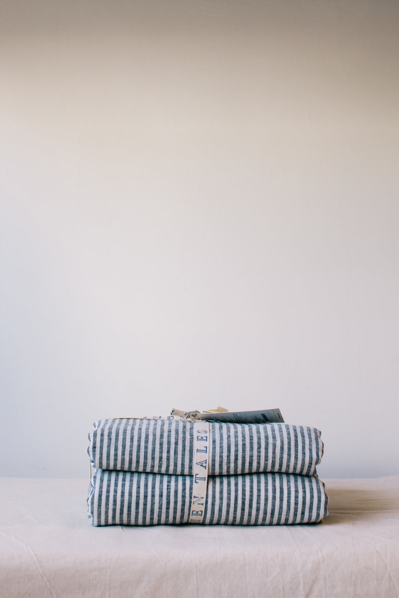 image of folded linen bedding grey and white stripes, Ondine Ash Falmouth